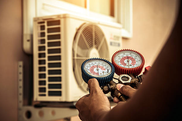 Professional Heat Pump Repair technician working in Piedmont, OK
